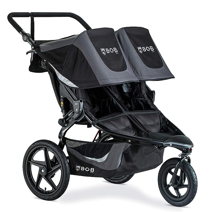 Black and grey double stroller by BOB with single wheel in front. Perfect fit for the top 10 double strollers for Disney World