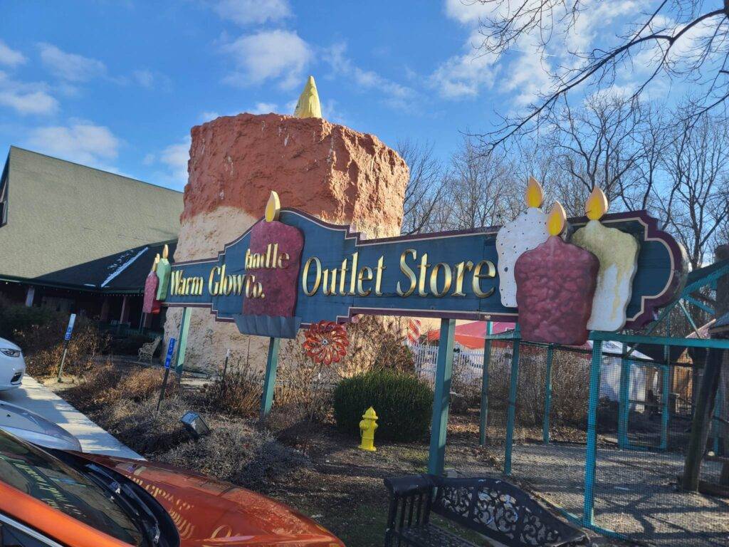 Large sign for Warm Glow Candle Outlet